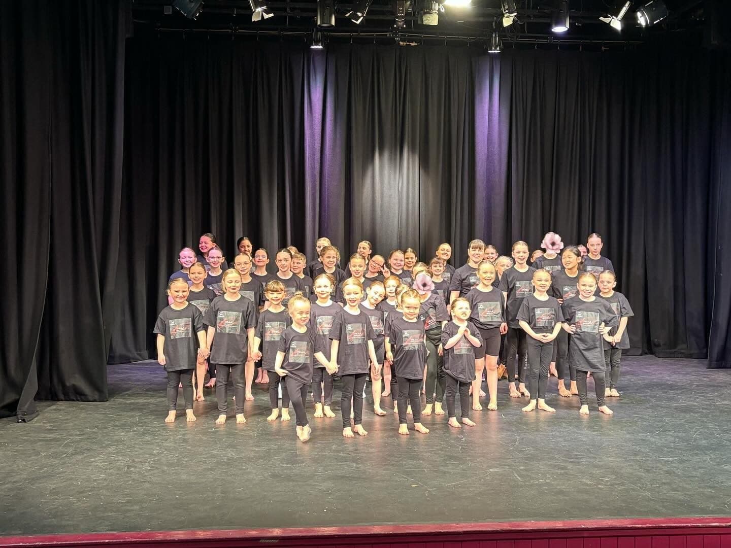 The full Amelia K Academy cast lined up on stage for the showcase finale